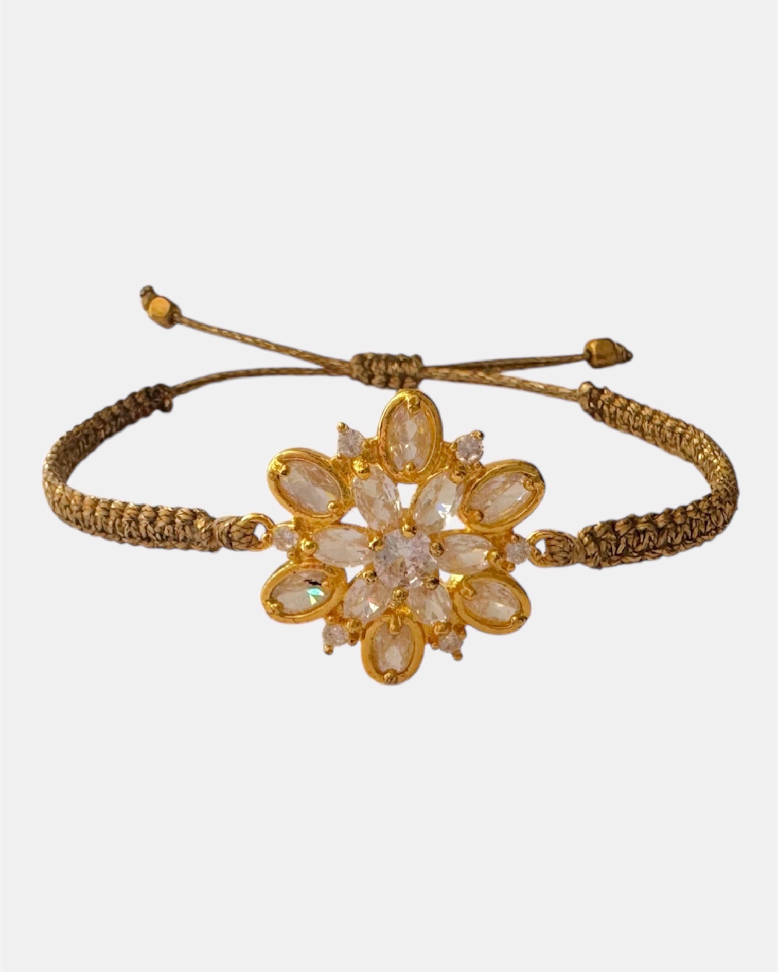 Macrame bracelet with gold flower charm