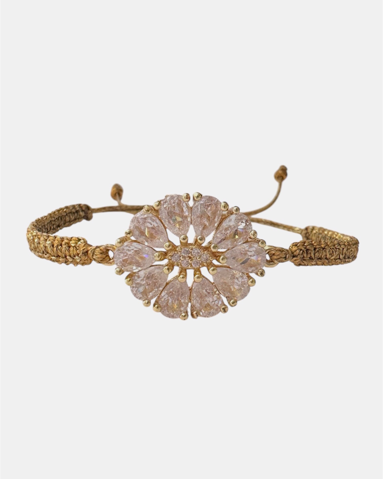 Macrame bracelet with gold oval flower charm