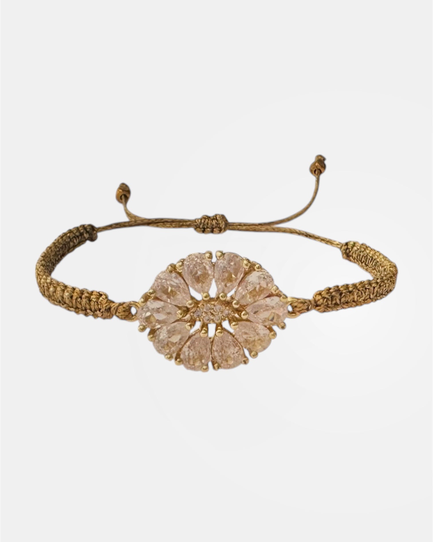 Macrame bracelet with gold oval flower charm
