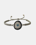 Grey macramé bracelet with eye charm handmade jewelry design