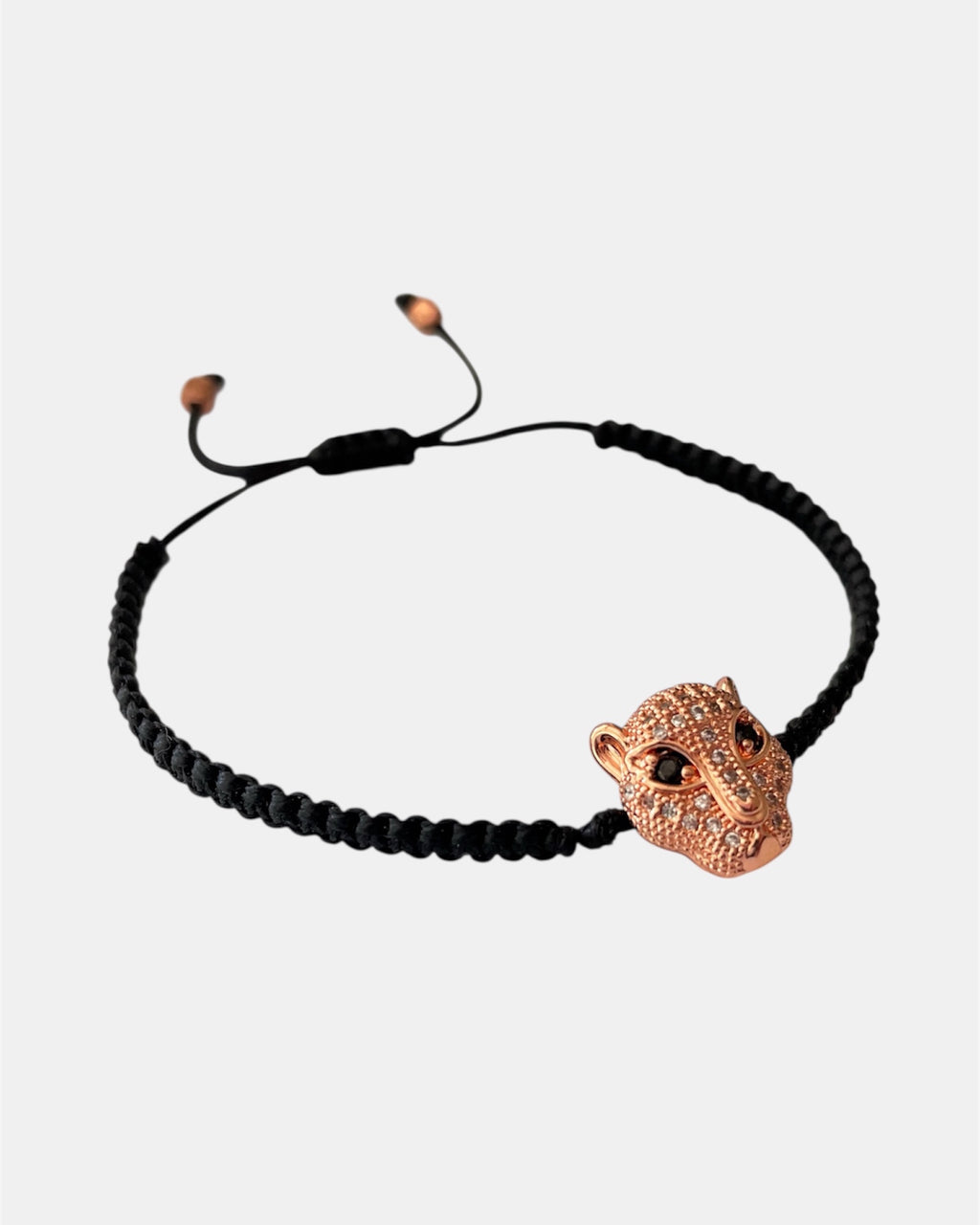 Μακραμέ βραχιόλι με μαύρο κορδόνι και ροζ χρυσό στοιχείο πάνθηρα