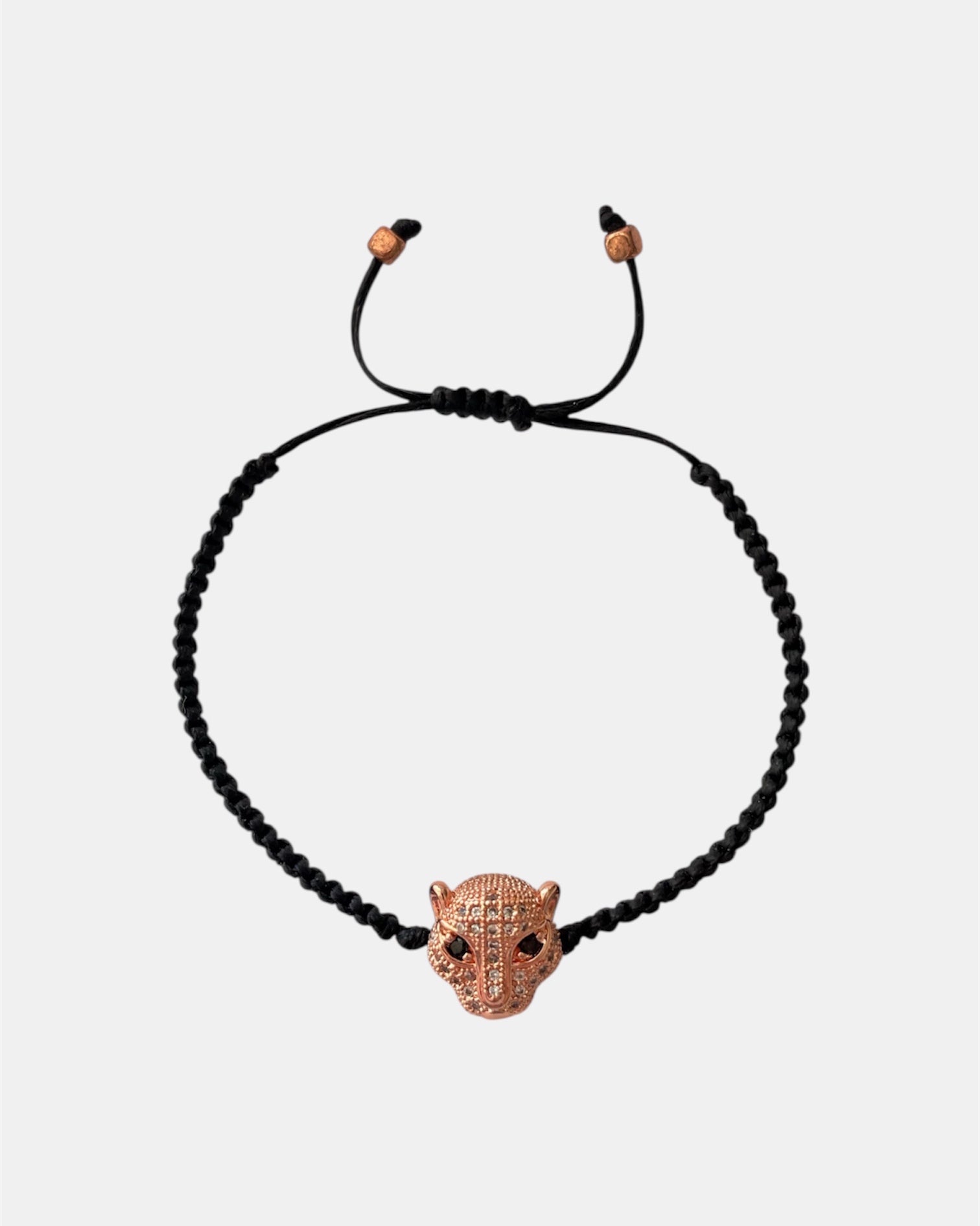 Μακραμέ βραχιόλι με μαύρο κορδόνι και ροζ χρυσό στοιχείο πάνθηρα