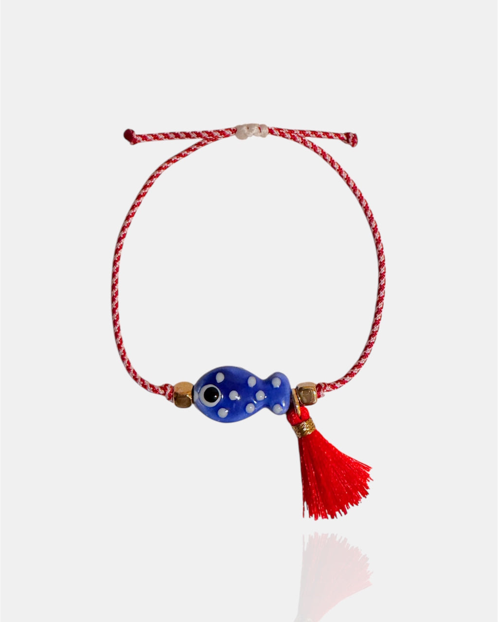 Χειροποίητο μαρτάκι με μπλε κεραμικό ψαράκι και κόκκινη φούντα, βραχιόλι Μαρτίου για γυναίκα.