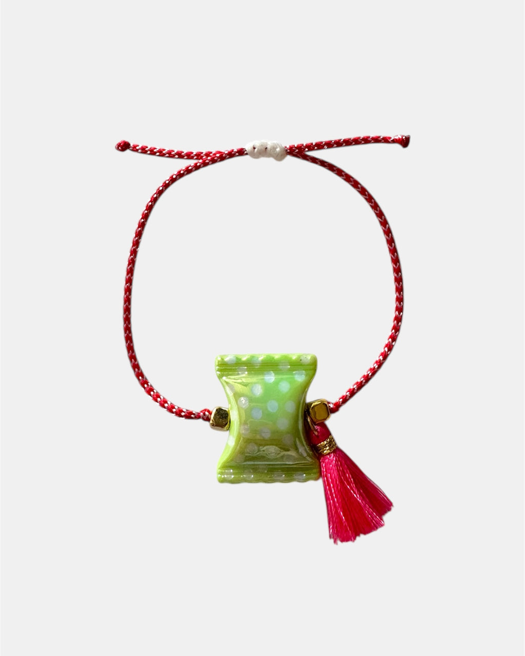 Χειροποίητο μαρτάκι με πράσινο γυάλινο στοιχείο και κόκκινη φούντα σε κόκκινο-λευκό κορδόνι