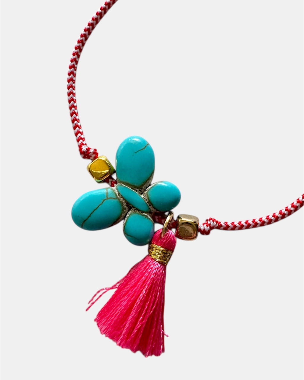 Χειροποίητο μαρτάκι με τιρκουάζ λουλούδι και κόκκινη φούντα σε κόκκινο-λευκό κορδόνι