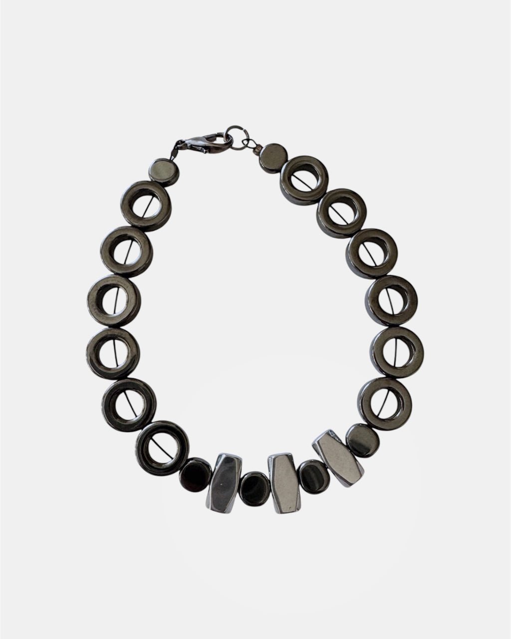 Μαύρο βραχιόλι με ροδέλες αιματίτη, γυναικείο χειροποίητο κόσμημα.