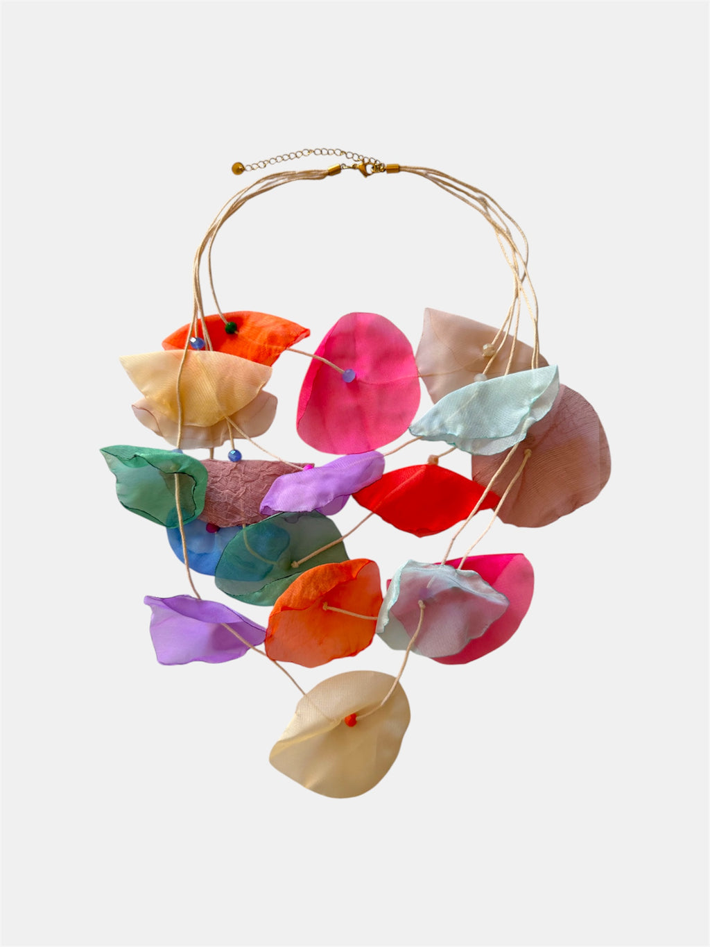 Multicolored necklace adorned with fabric flowers for a vibrant and whimsical style