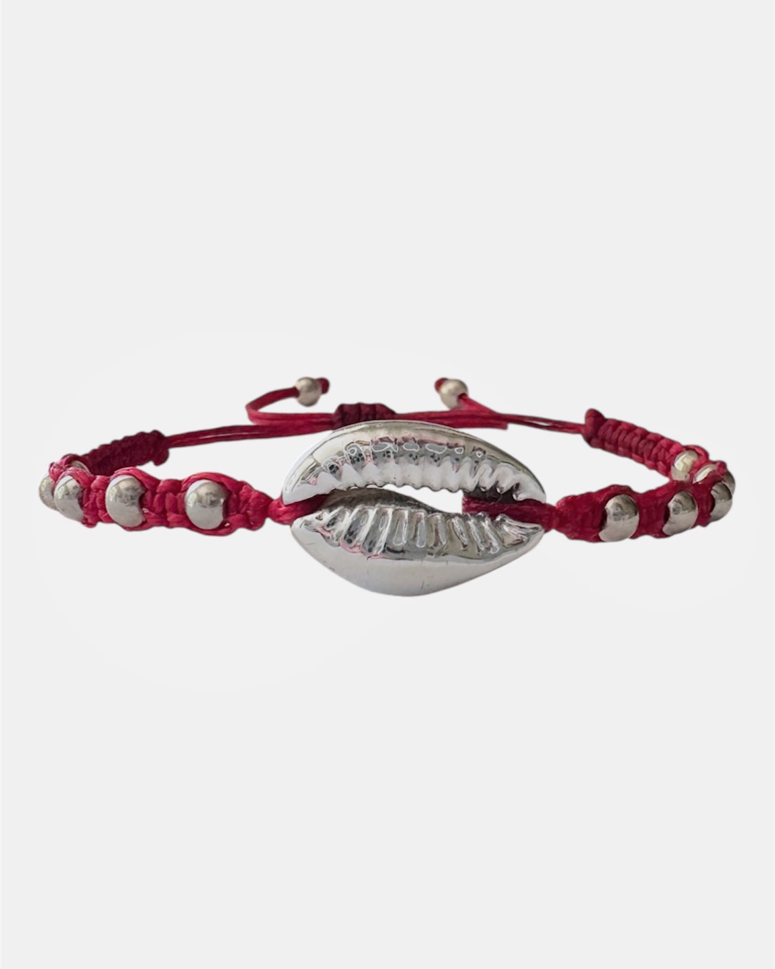 Pink macrame bracelet with silver shell charm