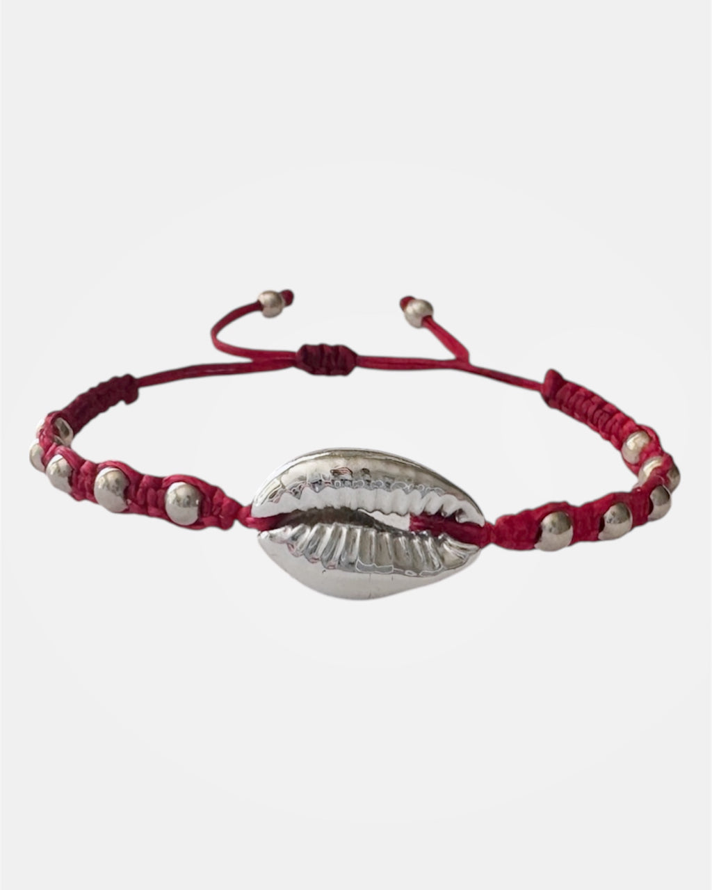 Pink macrame bracelet with silver shell charm