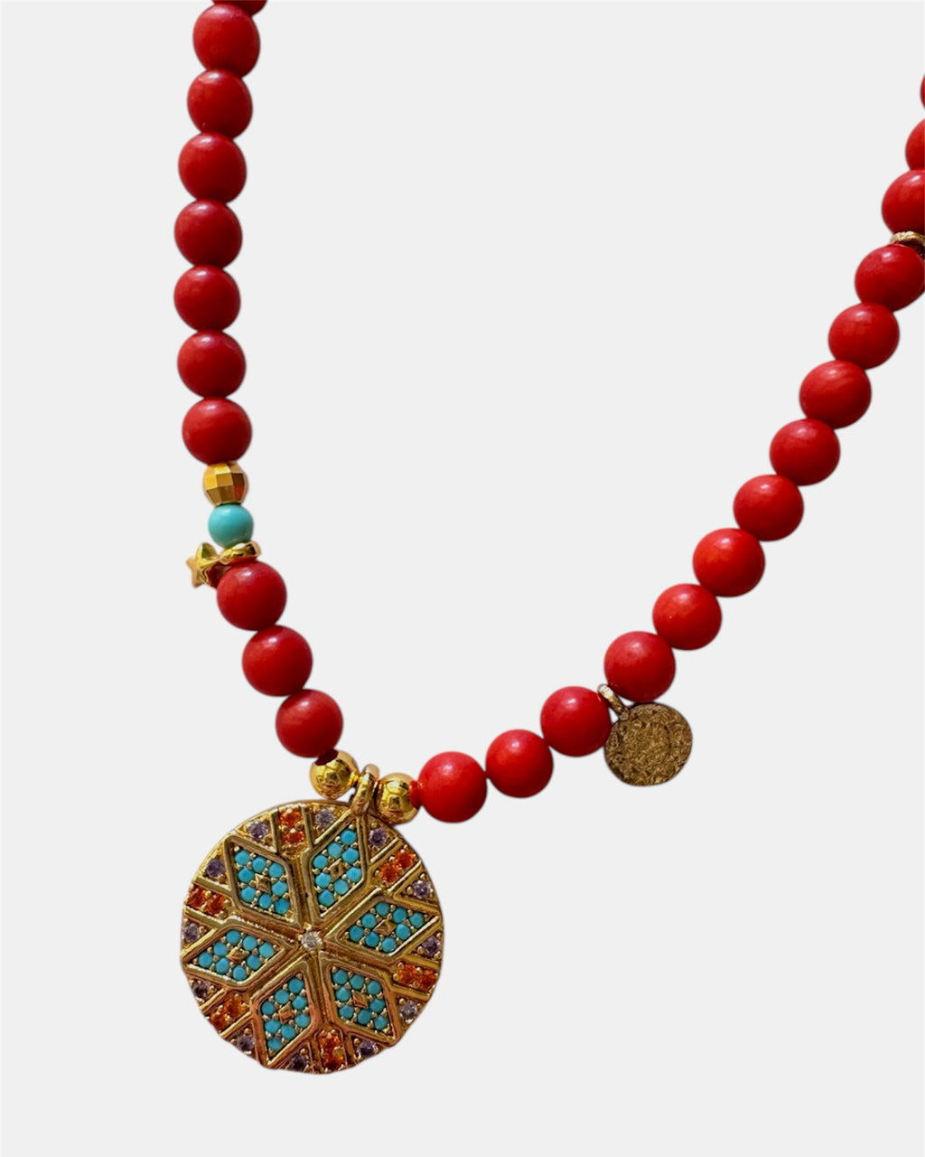 Red beaded necklace featuring a decorative motif charm for a bold and stylish accessory