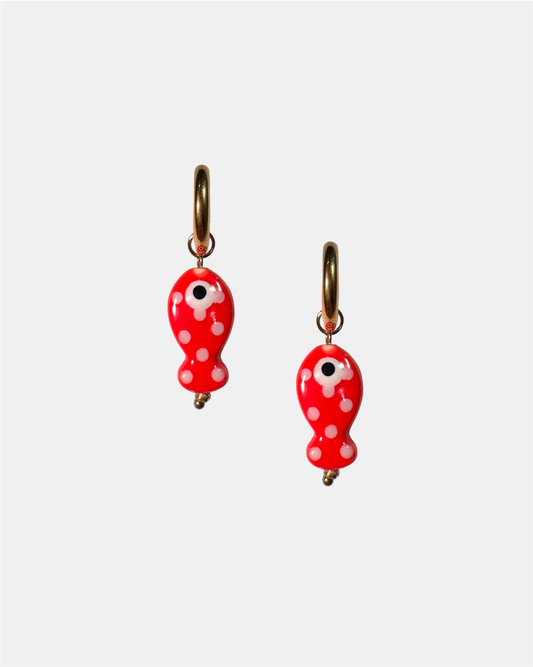 Red fish earrings.