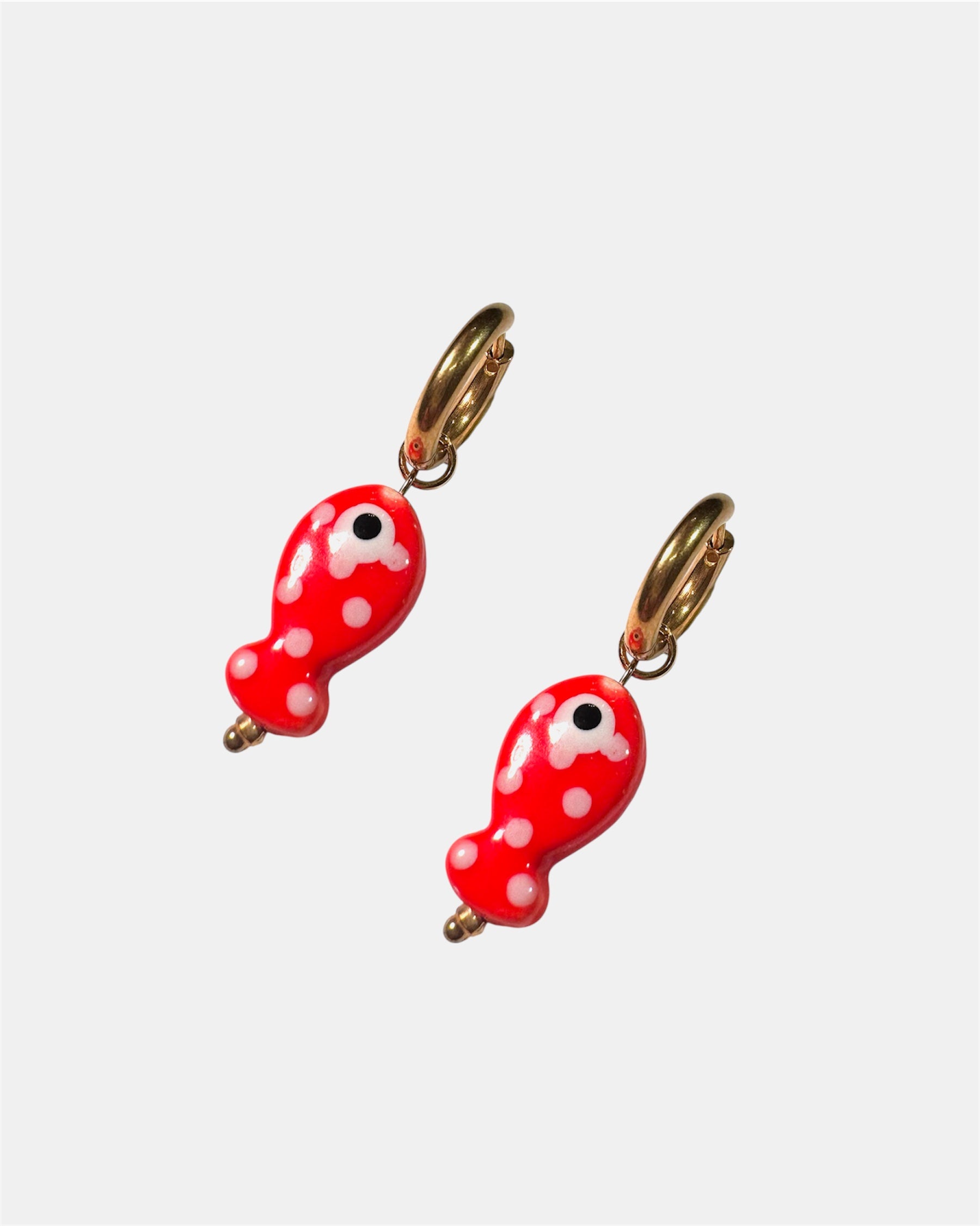 Red fish earrings.
