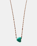Rose gold chain necklace with a green heart charm