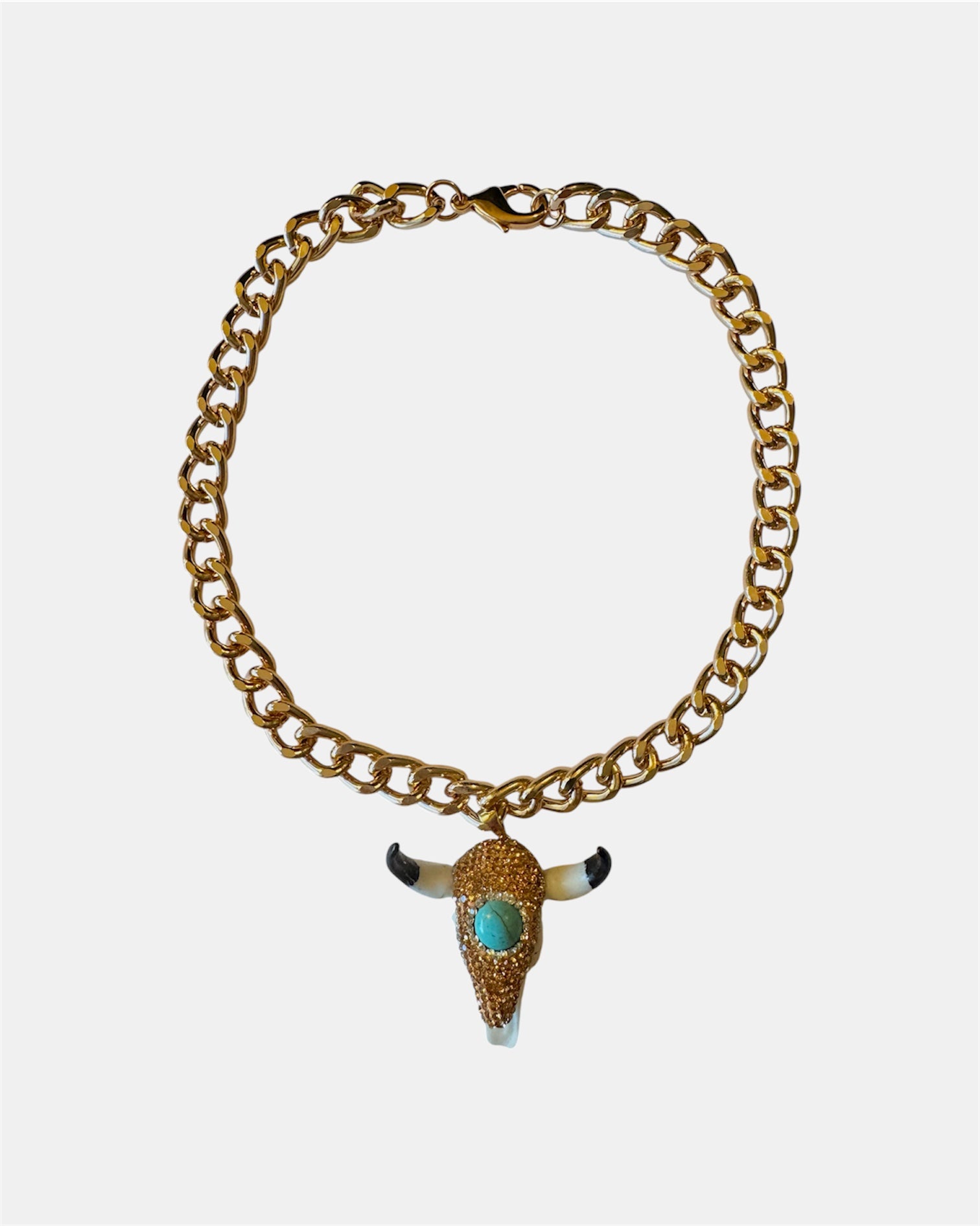 Rose gold chain necklace with a Taurus pendant