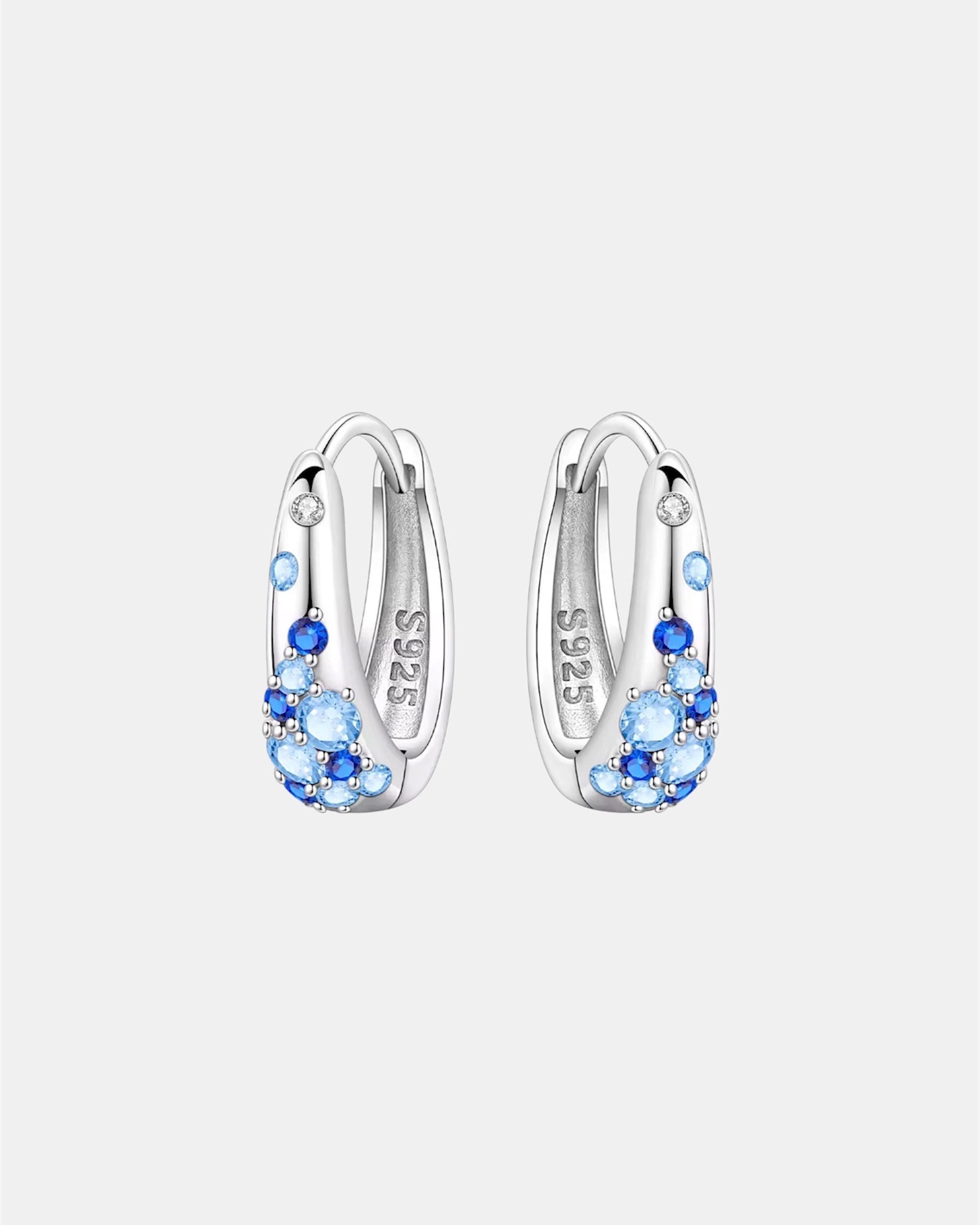 Silver 925 earrings with blue zircon stones and elegant polished finish