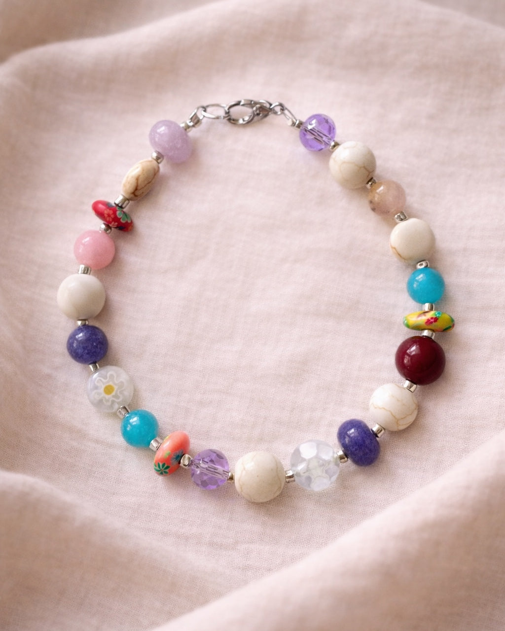 Silver bracelet with multicolored beads