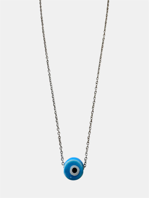 Silver chain necklace with a blue ceramic evil eye charm