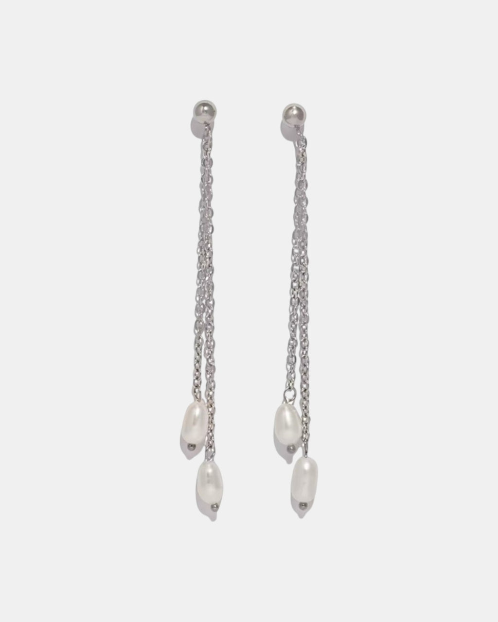 Silver dangle earrings with a pearl charm
