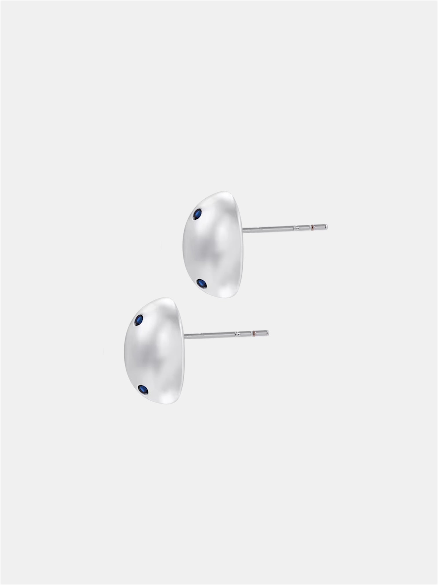 Silver earrings with egg design