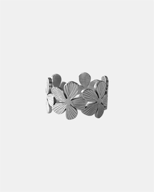 Silver open ring with floral design elegant jewelry piece