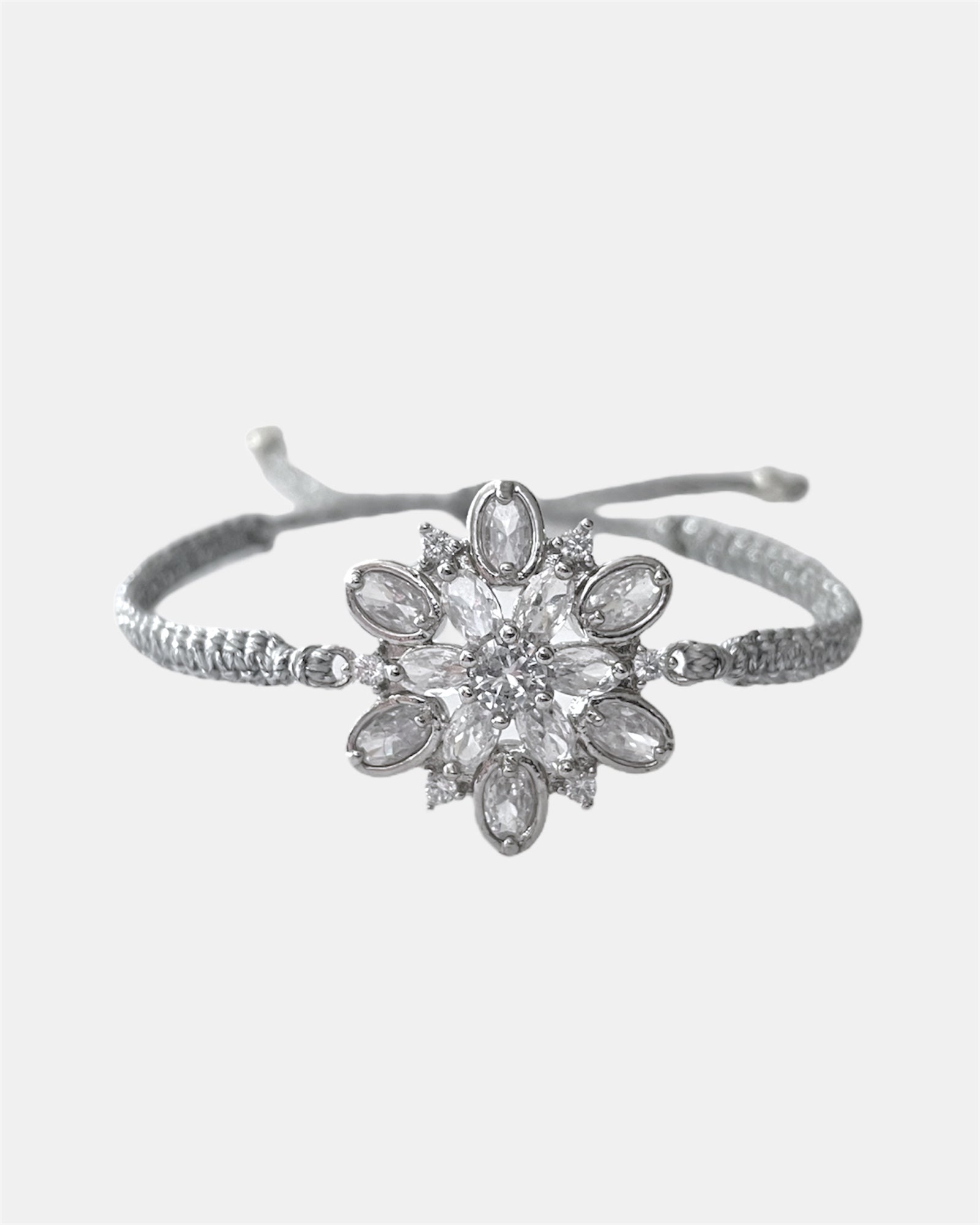 silver macrame bracelet with flower charm