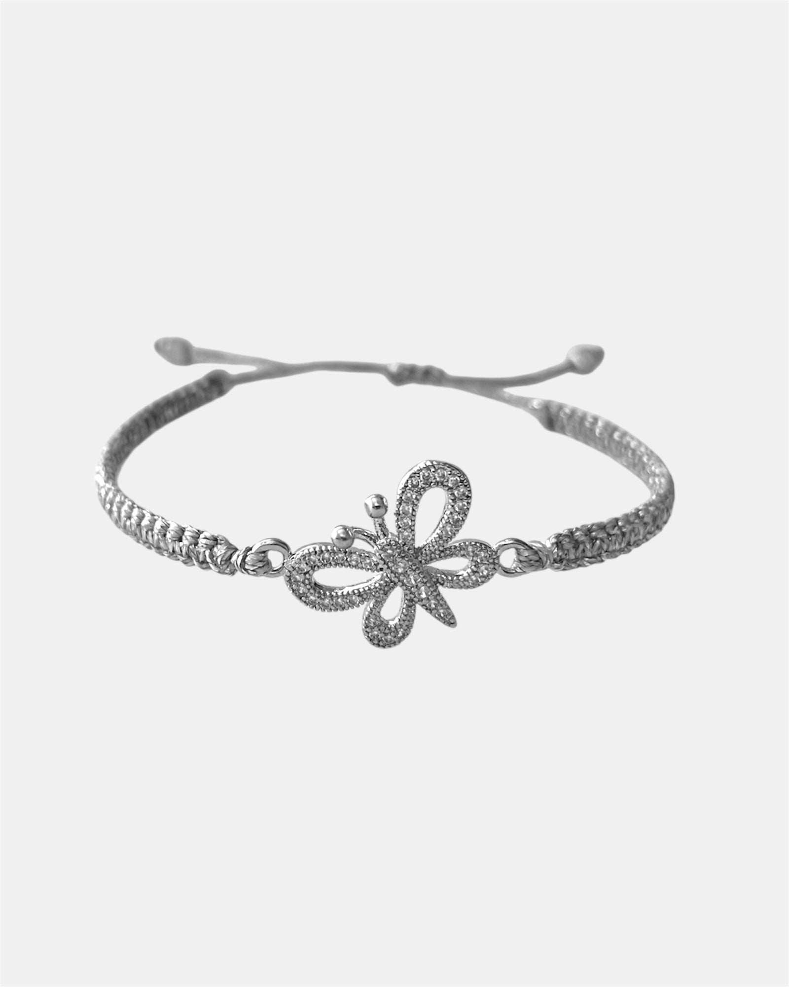 Silver macrame bracelet with zircon butterfly detail