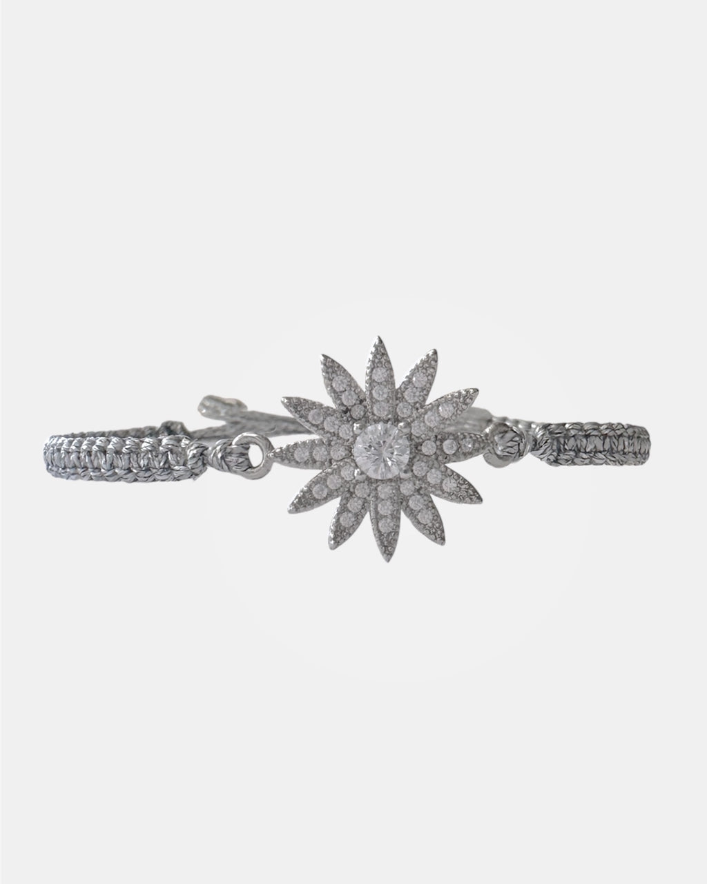 Silver macrame bracelet with zircon flower