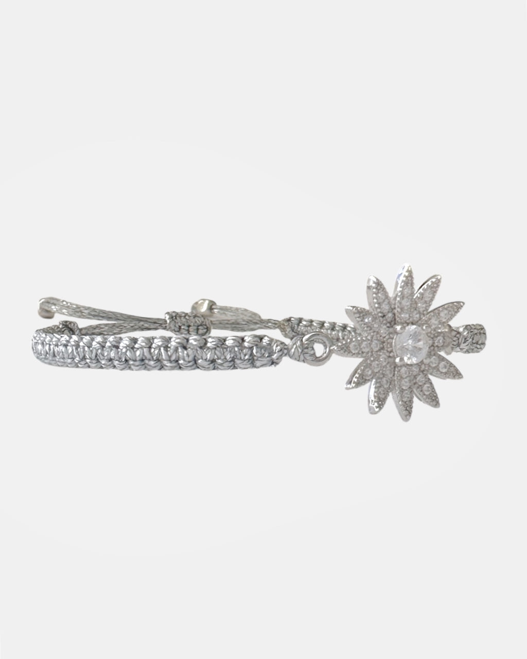 Silver macrame bracelet with zircon flower
