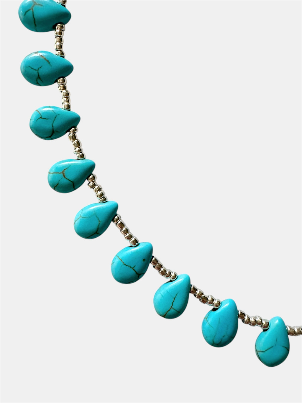 Turquoise necklace on a white background