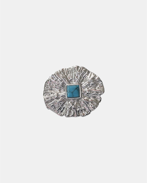 Silver open ring with light blue stone elegant jewelry design