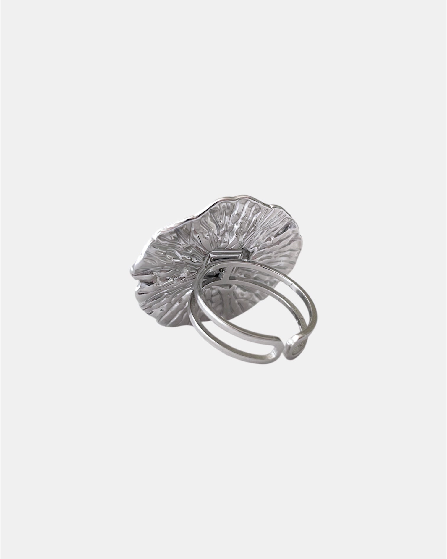 Silver open ring with light blue stone elegant jewelry design