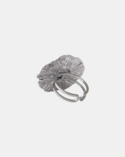Silver open ring with light blue stone elegant jewelry design