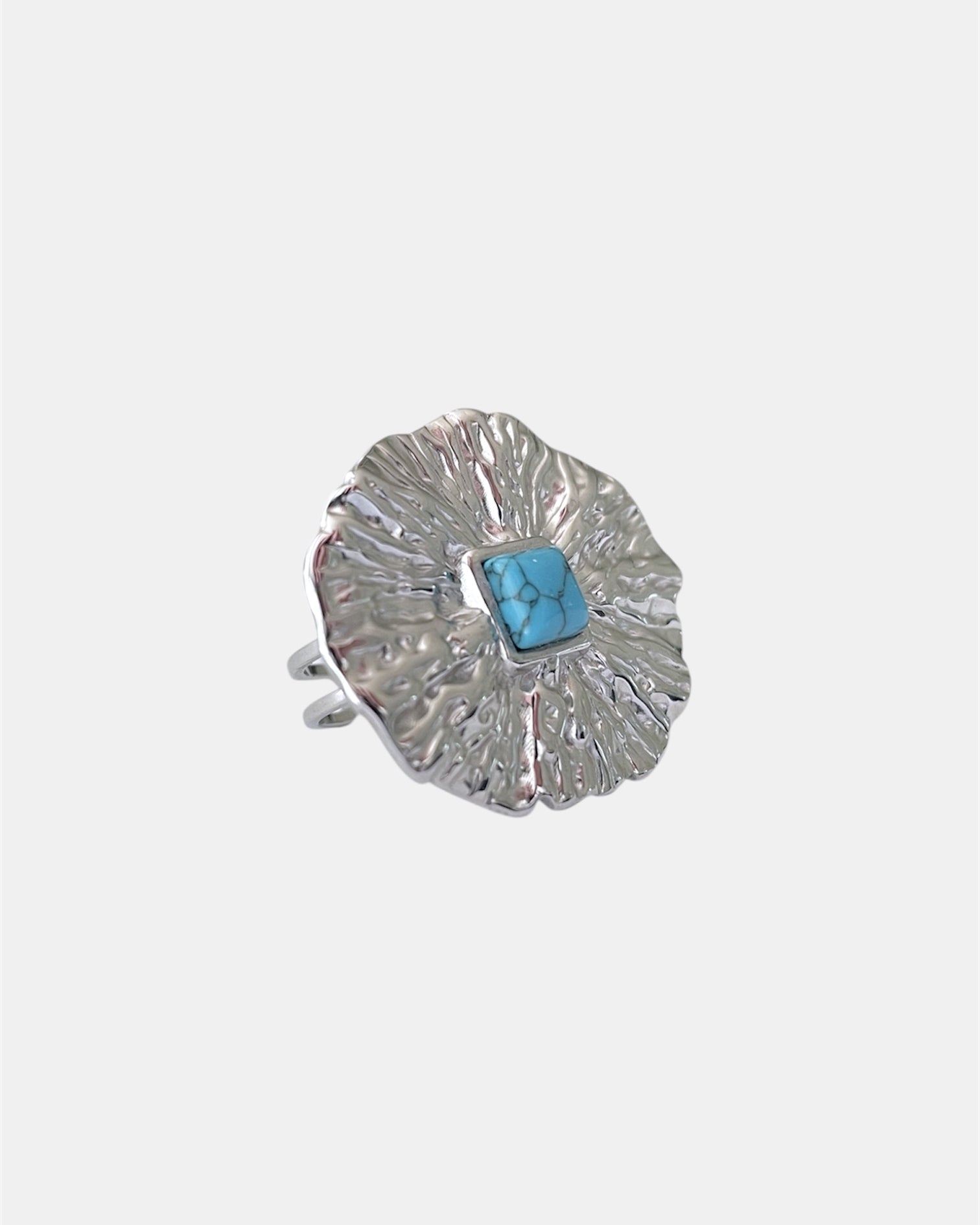 Silver open ring with light blue stone elegant jewelry design