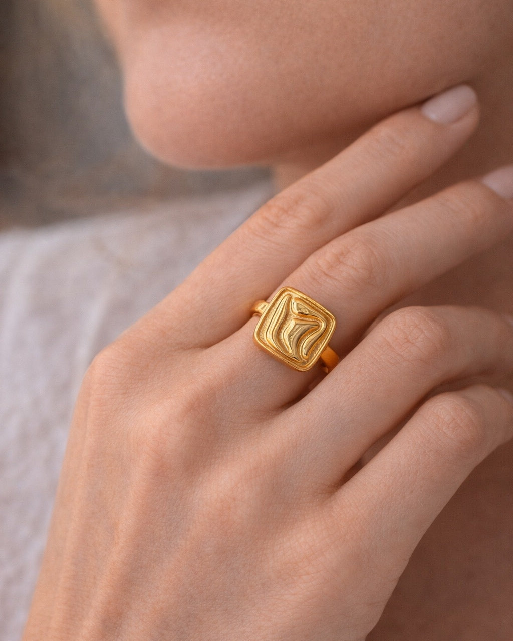 Square gold ring with embossed texture
