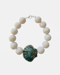 White bracelet with lava stone and ceramic shell