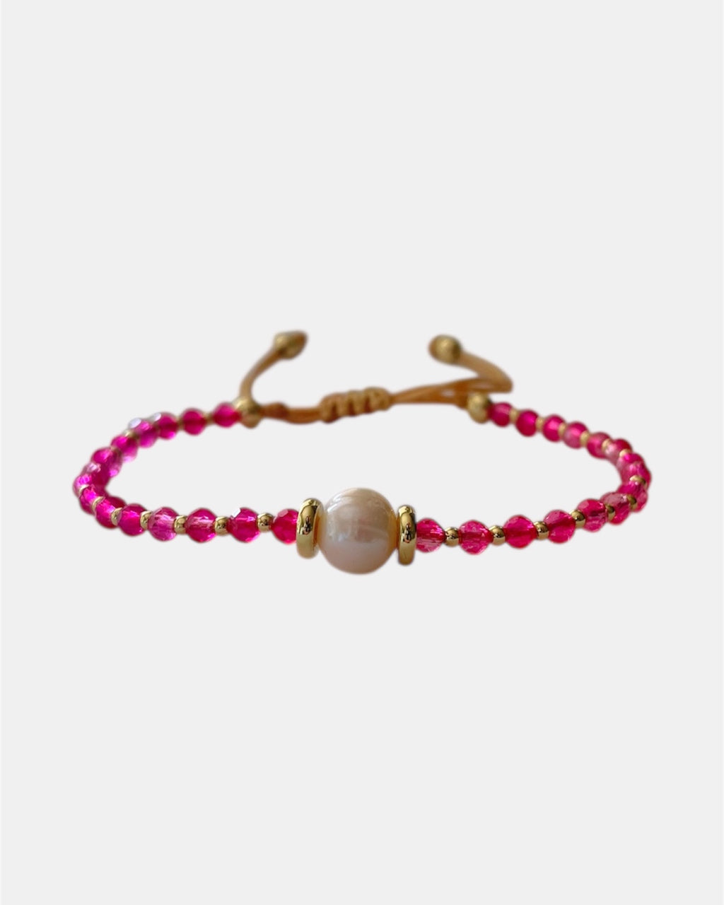 Χειροποίητο βραχιόλι με φούξια χάντρες και φυσικό μαργαριτάρι σε ρυθμιζόμενο κορδόνι